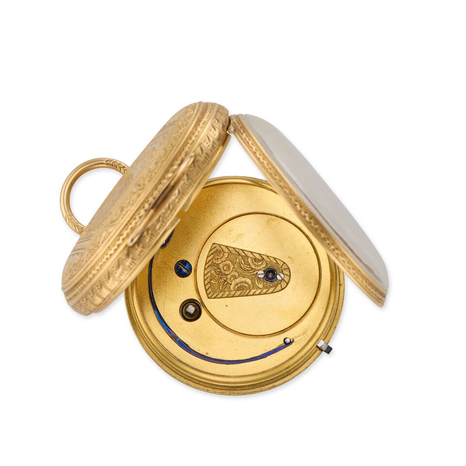 An 18K gold key wind open face pocket watch London Hallmark for 1873 - 4