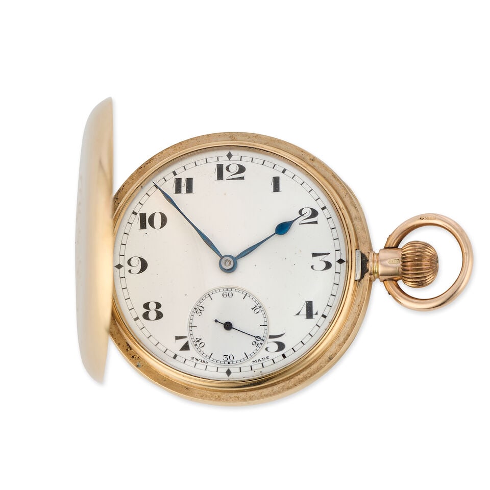 Tavannes Watch Co. A 9K gold keyless wind full hunter pocket watch London Import mark for 1919: Tavannes Watch Co. A 9K gold keyless wind full hunter pocket watch Date: London Import mark for 1919 Movement: Swiss lever Dial: White Case: Polished round, personal inscription to cuvette, No.9109606