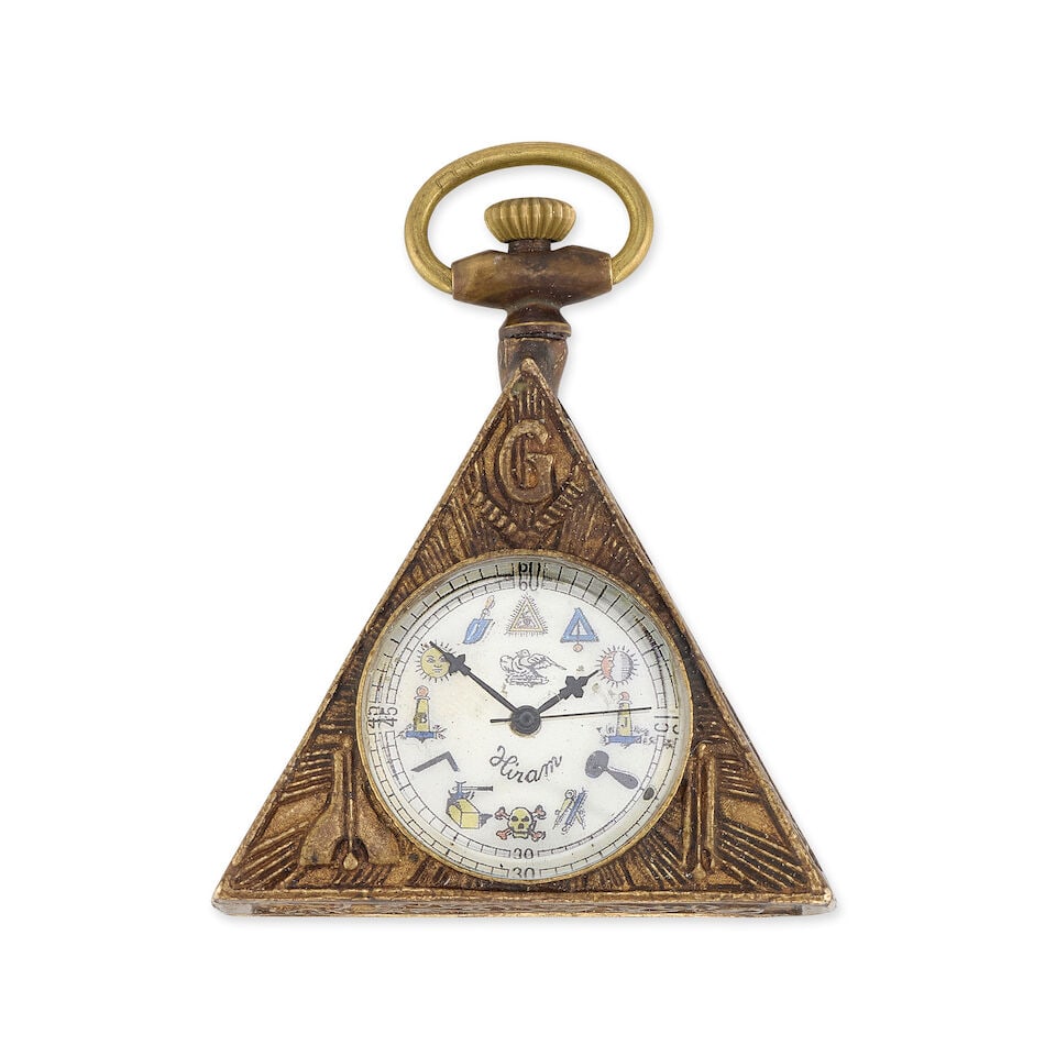 Hiram. A gilt metal keyless wind Masonic style triangular pocket watch Circa 1990: Hiram. A gilt metal keyless wind Masonic style triangular pocket watch Date: Circa 1990 Movement: 17-jewel, Swiss lever Dial: Cream Case: Triangular form Signed: Dial Size: 44mm For further