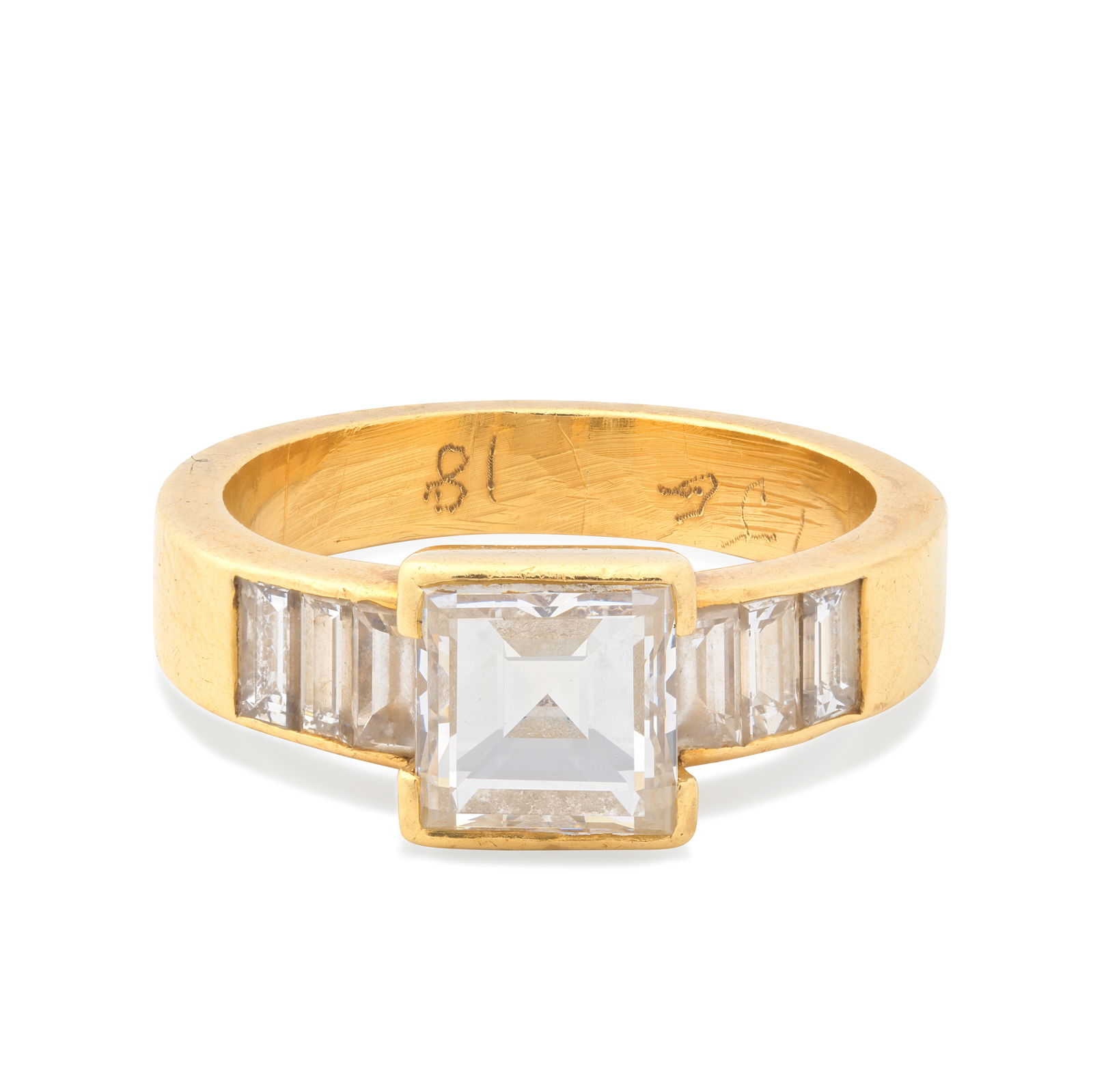 ADLER: DIAMOND RING, CIRCA 1987: ADLER: DIAMOND RING, CIRCA 1987The square-cut diamond between baguette-cut diamond shoulders, mounted in 18 carat gold, maker's marks AJLd, London import mark, principal diamond approx. 1.40cts,