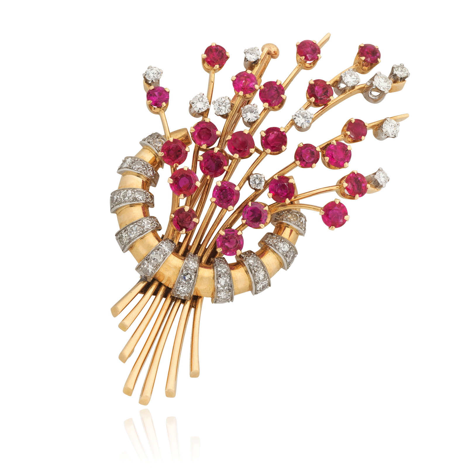 RUBY AND DIAMOND BROOCH, 1946: RUBY AND DIAMOND BROOCH, 1946Of spray design, set with circular-cut rubies and brilliant-cut diamonds, mounted in 18 carat gold, maker's mark H.B & Co., London hallmark, Swedish assay mark, length