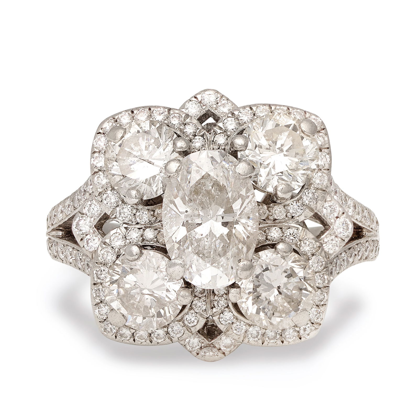 DAVID MARSHALL: DIAMOND RING: DAVID MARSHALL: DIAMOND RINGCentred by an oval-cut diamond within a quatrefoil of brilliant-cut diamonds, to bifurcated shoulders of further brilliant-cut diamonds, mounted in platinum, maker's mark