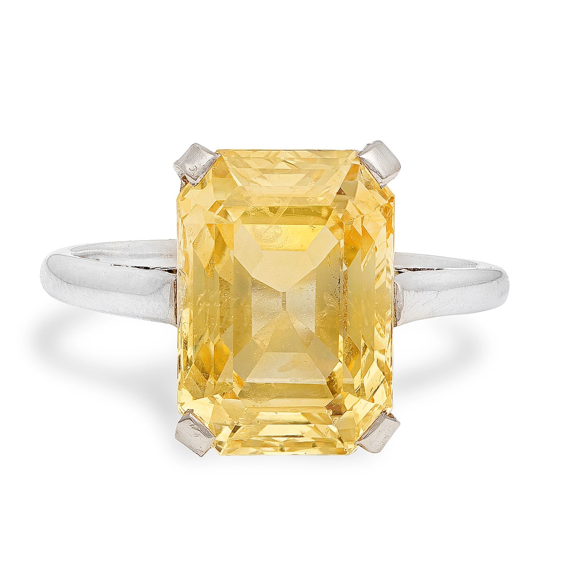 YELLOW SAPPHIRE RING: YELLOW SAPPHIRE RINGThe octagonal step-cut yellow sapphire weighing 7.50 carats, ring size approx. J½Footnotes:The Gem & Pearl Laboratory: Natural sapphire with no evidence of heat treatment.