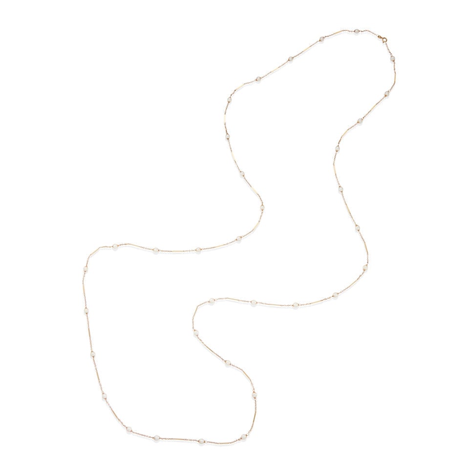 14K GOLD AND CULTURED PEARL NECKLACE: 14K GOLD AND CULTURED PEARL NECKLACE • 14k yellow gold • Numerous round cultured pearls measuring approximately 5.34 - 5.39 mm • Maker's mark • Length 58 1/2 in. •
