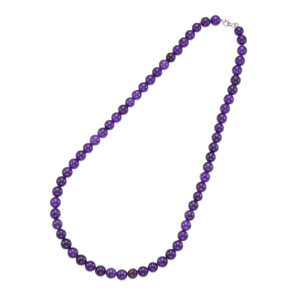 18K GOLD AND DYED QUARTZ BEAD NECKLACE: 18K GOLD AND DYED QUARTZ BEAD NECKLACE • 18k white gold clasp • Numerous round dyed quartz beads 7.82 x 8.32 mm • Length 20 1/2 in. • Estimated gross weight: 47.4 grams Footnot