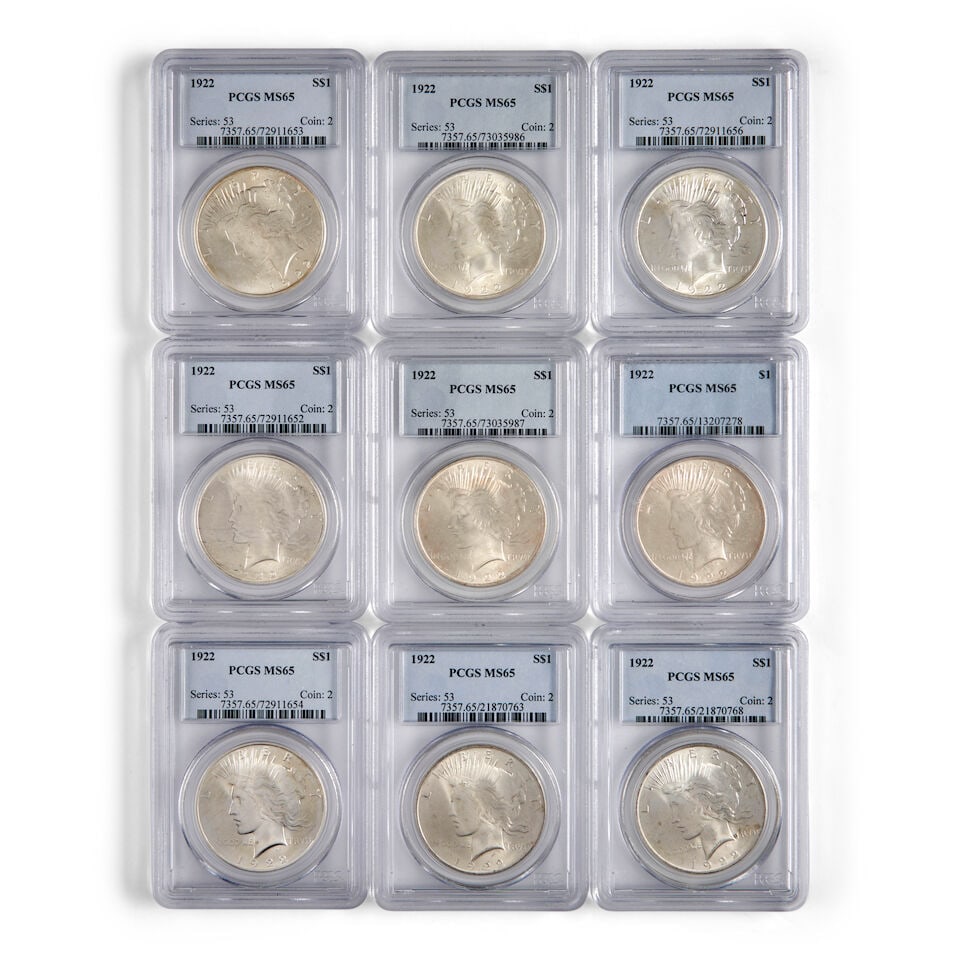 NINE UNITED STATES 1922 PEACE DOLLARS, PCGS MS65. (1 of 2)