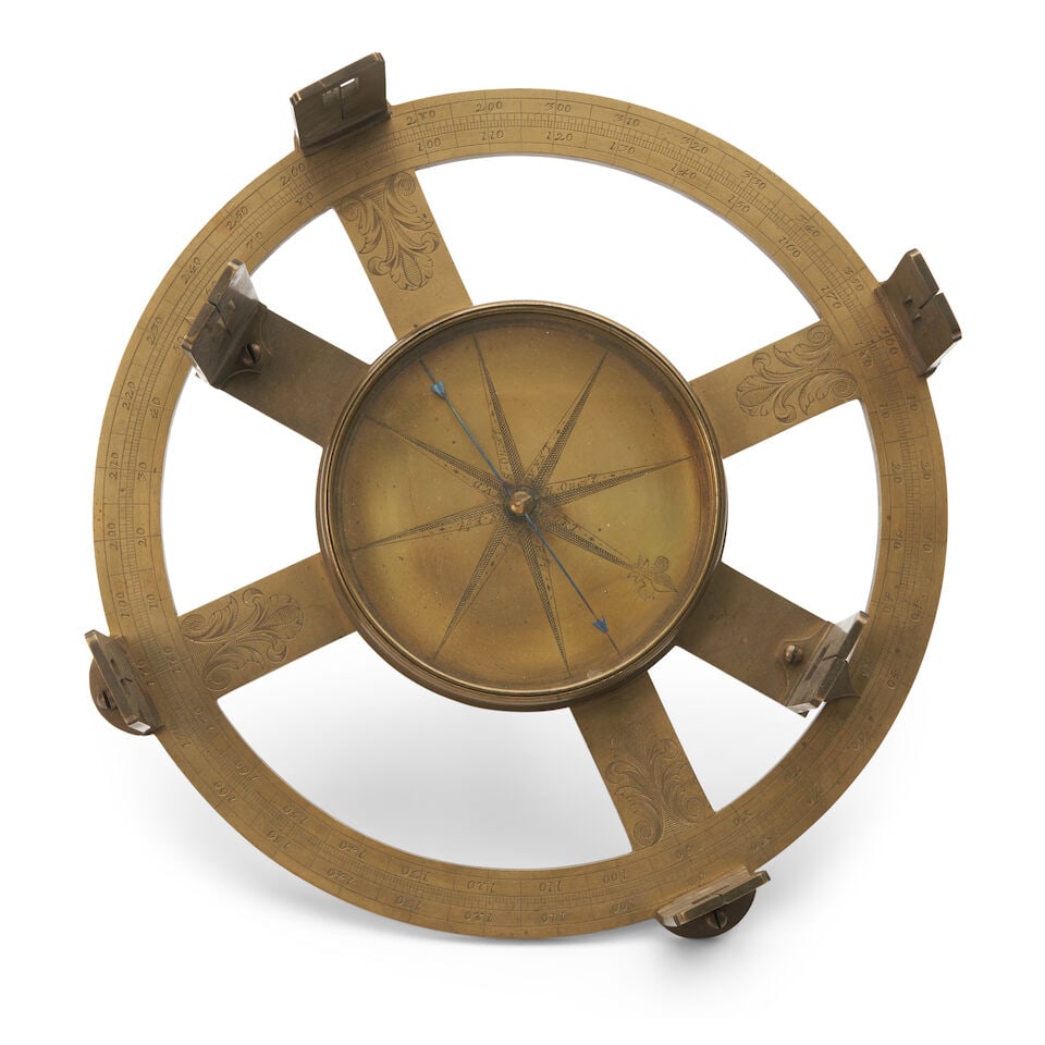A Brass Circumferentor, France, late 18th century,: A Brass Circumferentor, France, late 18th century, engraved 'MAVLEVAVT' and 'A. PARIS.,' ht. 8 1/2, dia. 10 1/2 in. Lot to be sold without reserve. This lot is subject to the following lot symbols: