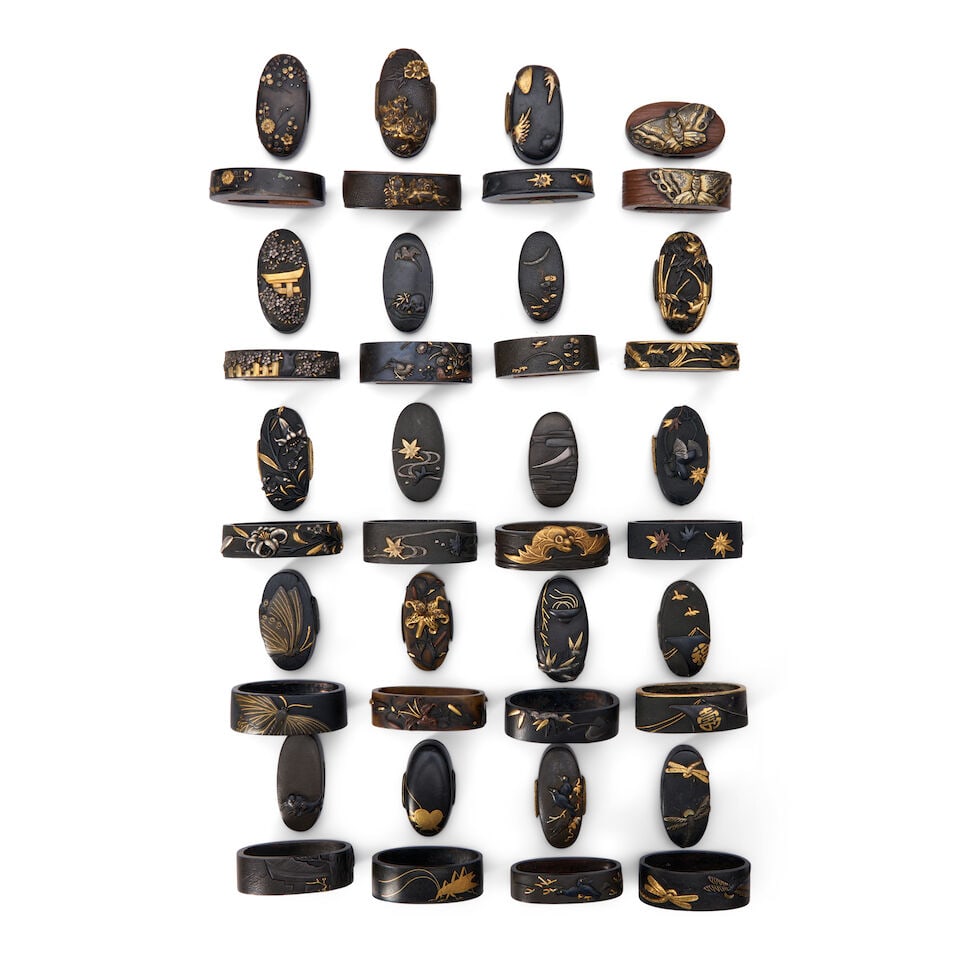 Twenty Mixed-Metal Fuchi-gashira Japan, (20): Twenty Mixed-Metal Fuchi-gashira Japan, All in matched sets, most shakudo with gilt decorations, eleven signed. 1 1/2in (3.8cm) width of widest (20). Lot to be sold without reserve. This lot is