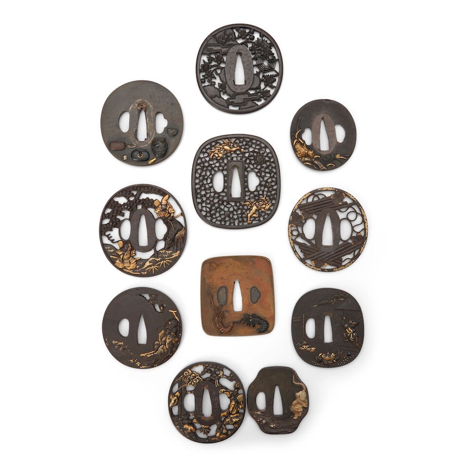 Eleven Mixed-Metal Tsuba, Japan, late Edo period (1615-1868) or Meiji era (1868-1912), (11): Eleven Mixed-Metal Tsuba, Japan, late Edo period (1615-1868) or Meiji era (1868-1912), Seven iron including six with gilt decorations; three shibuichi including one with a nanako ground, and one