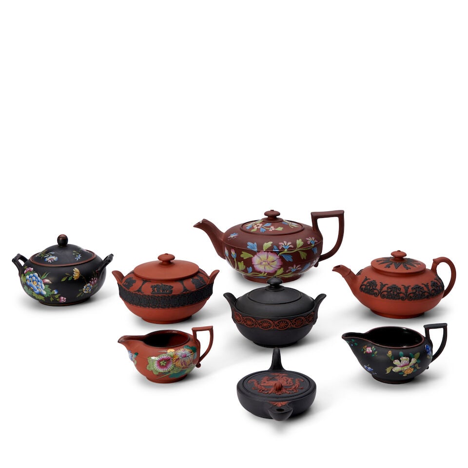 Seven Wedgwood Rosso Antico and Basalt Dry Body Wares and a Spode, England, 19th century,: Seven Wedgwood Rosso Antico and Basalt Dry Body Wares and a Spode, England, 19th century, comprising an enamel-decorated rosso antico creamer, an enamel-decorated black basalt creamer and covered