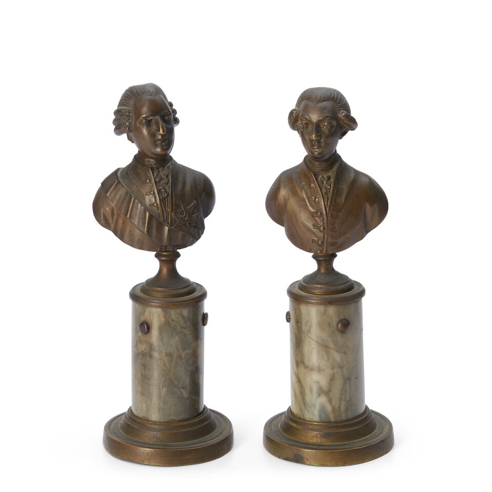 Pair of Bronze Portrait Busts, France, 19th century,: Pair of Bronze Portrait Busts, France, 19th century, each mounted atop a cylindrical marble plinth with bronze foot, ht. 8 1/2 in. Lot to be sold without reserve. This lot is subject to the following