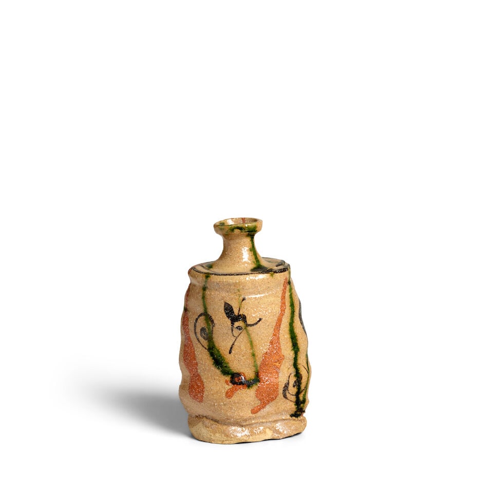 SUZUKI GORŌ 鈴木五郎 (B.1941) An Oribe-Style Tokkuri (Sake Bottle) ...: SUZUKI GORŌ 鈴木五郎 (B.1941) An Oribe-Style Tokkuri (Sake Bottle) Heisei era (1989-2009), 1998 The ribbed bottle with a flat base and shoulder and short neck with a