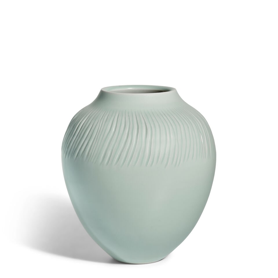 FUKAMI SUEHARU 深見陶治 (B.1947) A Seihakuji (Blue White Porcelain) Vase...: FUKAMI SUEHARU 深見陶治 (B.1947) A Seihakuji (Blue White Porcelain) Vase, Suji (Lines) Showa era (1926-1989), box dated 1987 The ovoid vase marked at the shoulder with freely-d