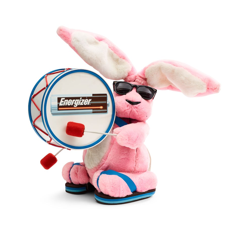 Energizer: A Remote-Control Energizer Bunny, Mid-1990s,: Energizer: A Remote-Control Energizer Bunny, Mid-1990s, Comprising: 1.A remote-control pink and white plush synthetic fur rabbit figure over an articulated frame with wheeled feet, wearing