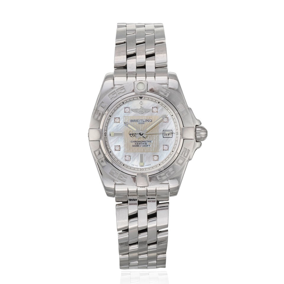 Breitling. A lady's stainless steel quartz calendar bracelet watch with Mother of Pearl dial Co...: Breitling. A lady's stainless steel quartz calendar bracelet watch with Mother of Pearl dial Model: Cockpit Lady Reference: A71356 Date: Circa 2010 Movement: Jewelled quartz, No.1272851 Dial: Mother o