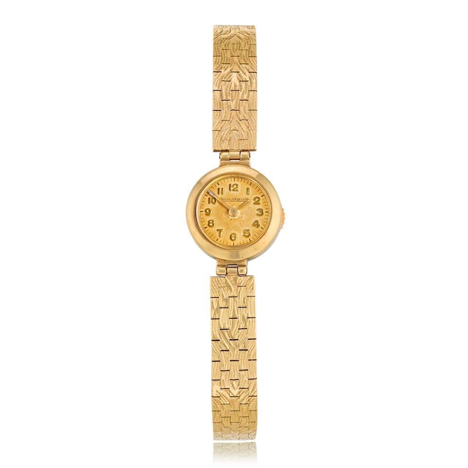 Jaeger-LeCoultre. A lady's 9K gold manual wind bracelet watch London Hallmark for 1959: Jaeger-LeCoultre. A lady's 9K gold manual wind bracelet watch Date: London Hallmark for 1959 Movement: Jewelled manual wind Dial: Silvered Case: Polished round, No.4265 Strap/Bracelet: 9K gold