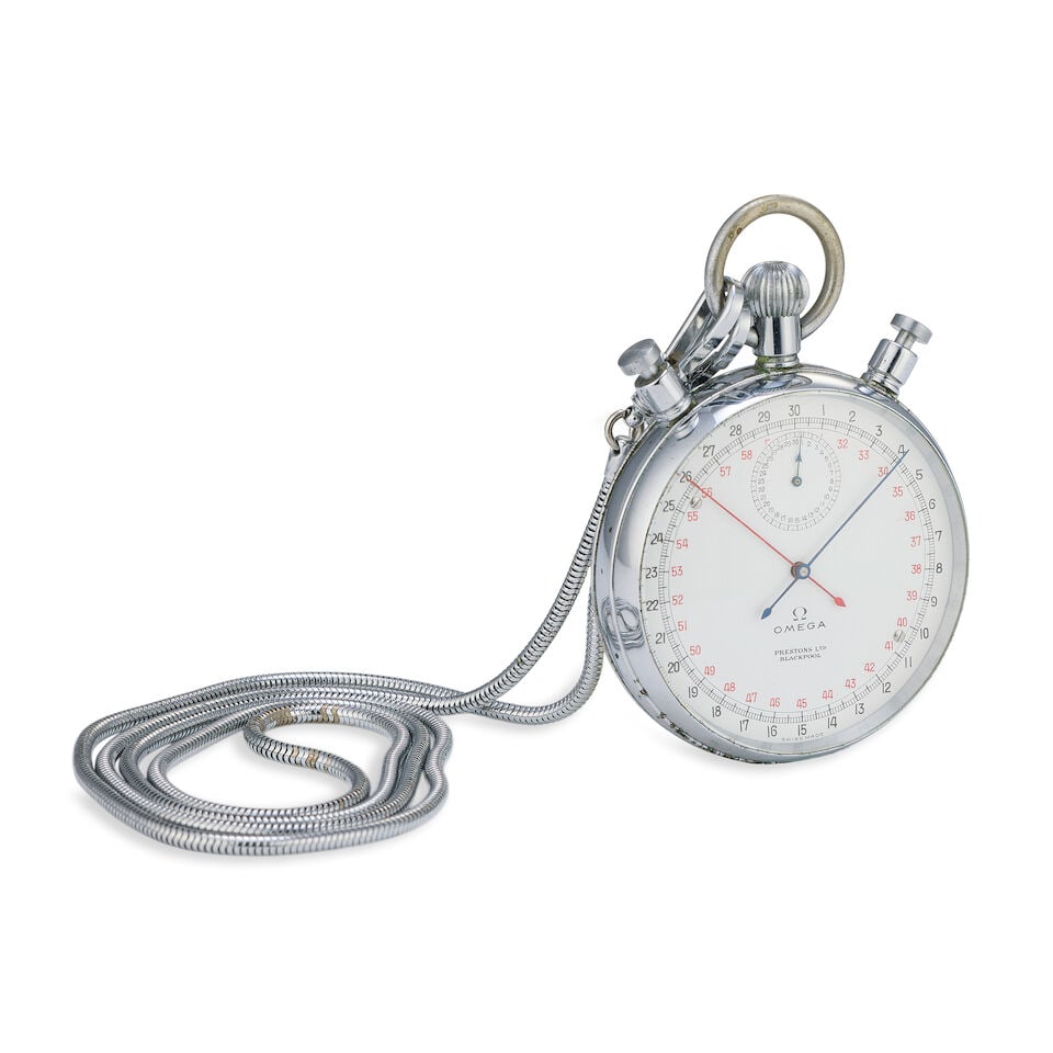 Omega. A metal keyless wind open face split 1/10th second stopwatch retailed by Prestons Ltd Bla... - 2