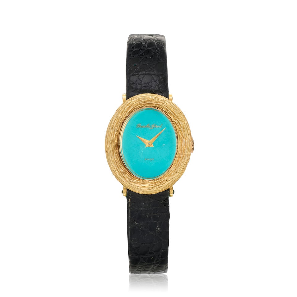 Bueche Girod. A lady's 18K gold manual wind wristwatch London Hallmark for 1970: Bueche Girod. A lady's 18K gold manual wind wristwatch Date: London Hallmark for 1970 Movement: 17-jewel Cal.69 manual wind Dial: Turquoise Case: Brushed and polished oval form, textured bezel Strap/B