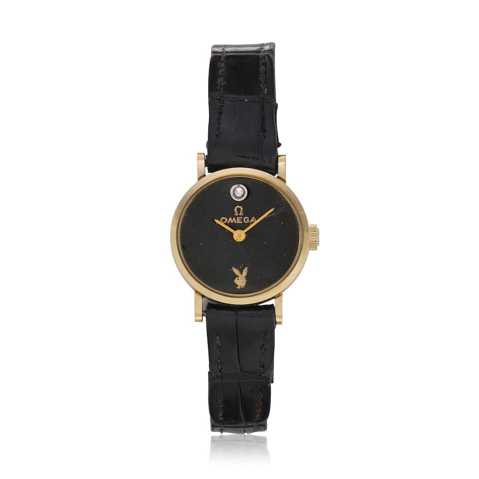 Omega. A lady's 14K gold diamond set manual wind wristwatch with custom Playboy dial Circa 1980: Omega. A lady's 14K gold diamond set manual wind wristwatch with custom Playboy dial Date: Circa 1980 Movement: 17-jewel Cal.625 manual wind, No.39688026 Dial: Custom black with Playboy emblem, diamon