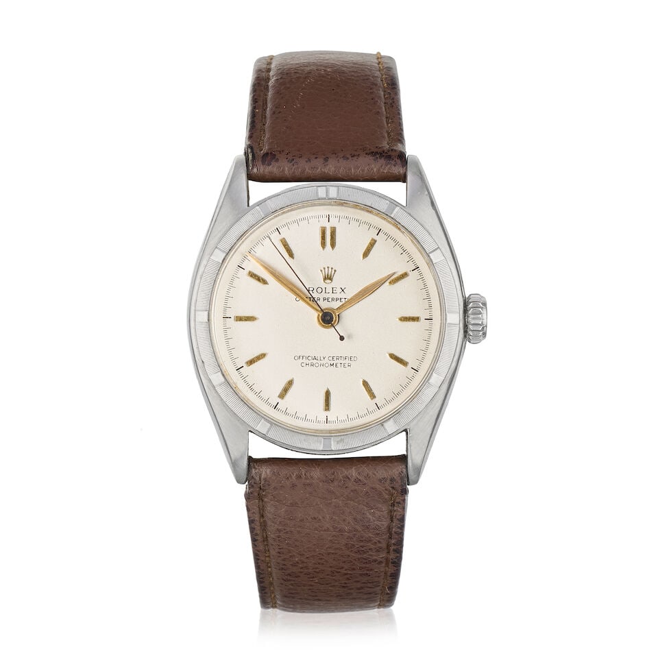 Rolex. A stainless steel automatic wristwatch Oyster Perpetual, Ref: 6085, Circa 1951: Rolex. A stainless steel automatic wristwatch Model: Oyster Perpetual Reference: 6085 Date: Circa 1951 Movement: 2-jewel automatic No.F 48287 04318 Dial: Silvered Case: Polished round, No.724135 Strap