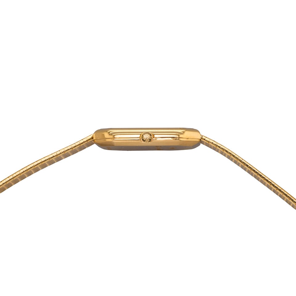 Patek Philippe. An 18K gold quartz bracelet watch Ref: 3853/3, Circa 1990 - 2
