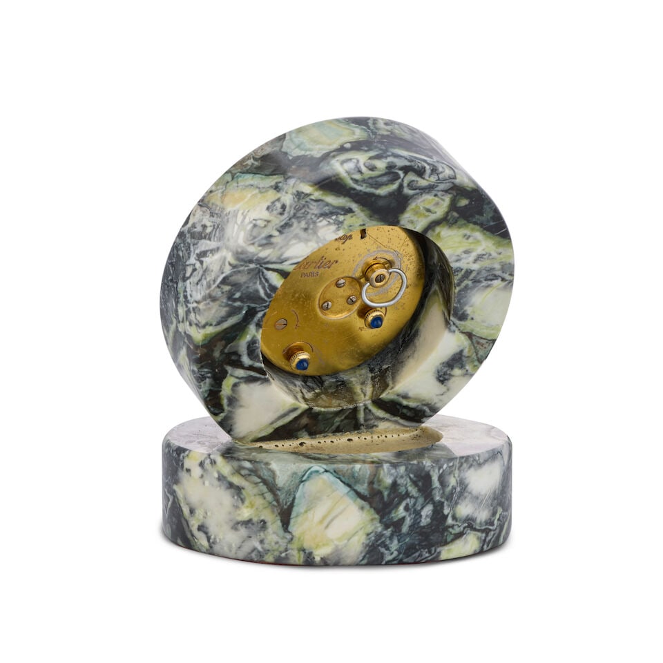 Cartier. A gilt and enamel desk clock with alarm in later marble mount Circa 1980 - 2