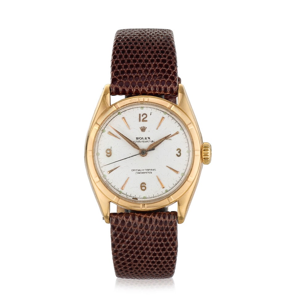 Rolex. An 18K gold automatic semi-bubbleback wristwatch Oyster Perpetual Chronometer, Ref: 6085,...: Rolex. An 18K gold automatic semi-bubbleback wristwatch Model: Oyster Perpetual Chronometer Reference: 6085 Date: Circa 1960 Movement: 2-jewel automatic, No.46773 F36757 Dial: White, applied gilt Arab