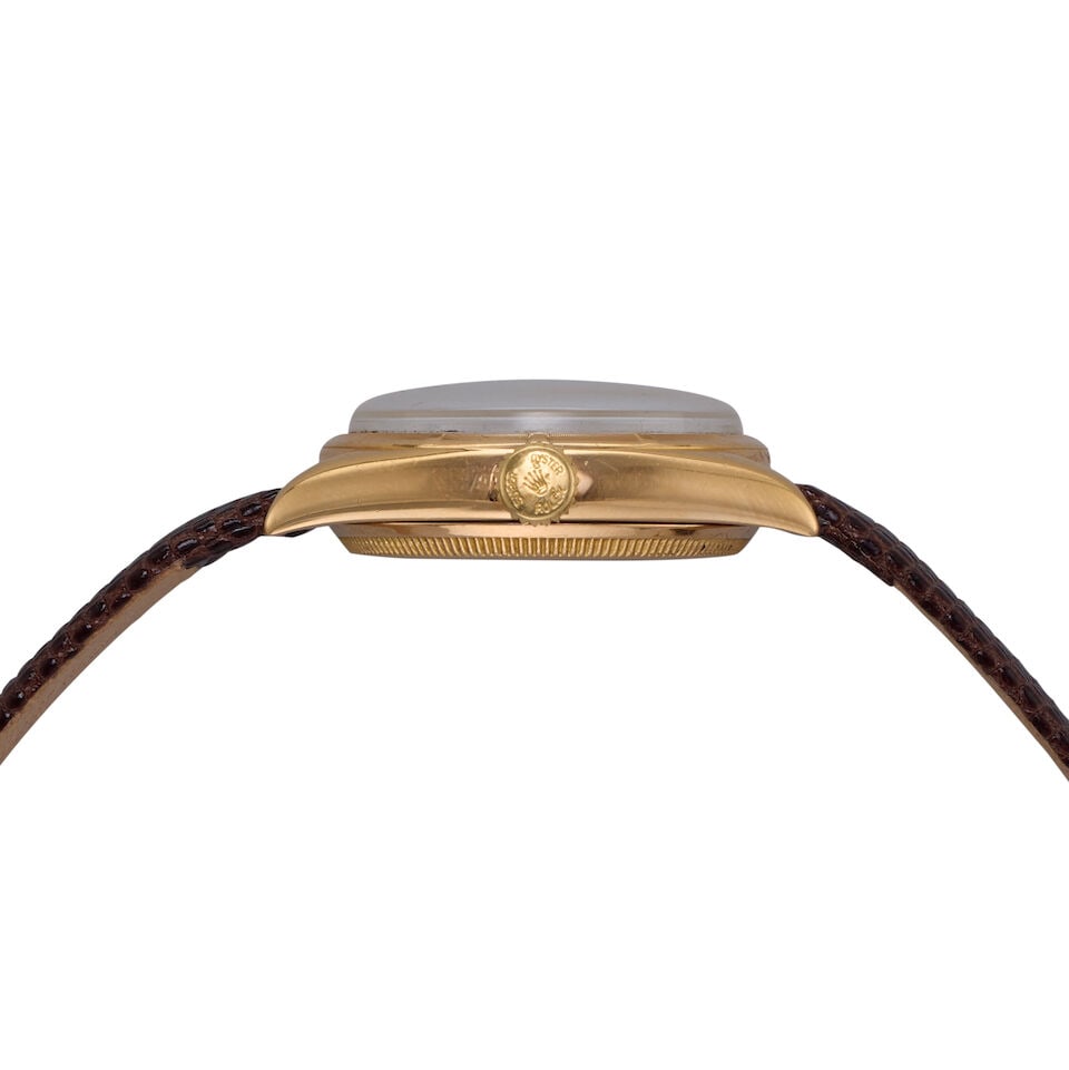 Rolex. An 18K gold automatic semi-bubbleback wristwatch Oyster Perpetual Chronometer, Ref: 6085,... - 2