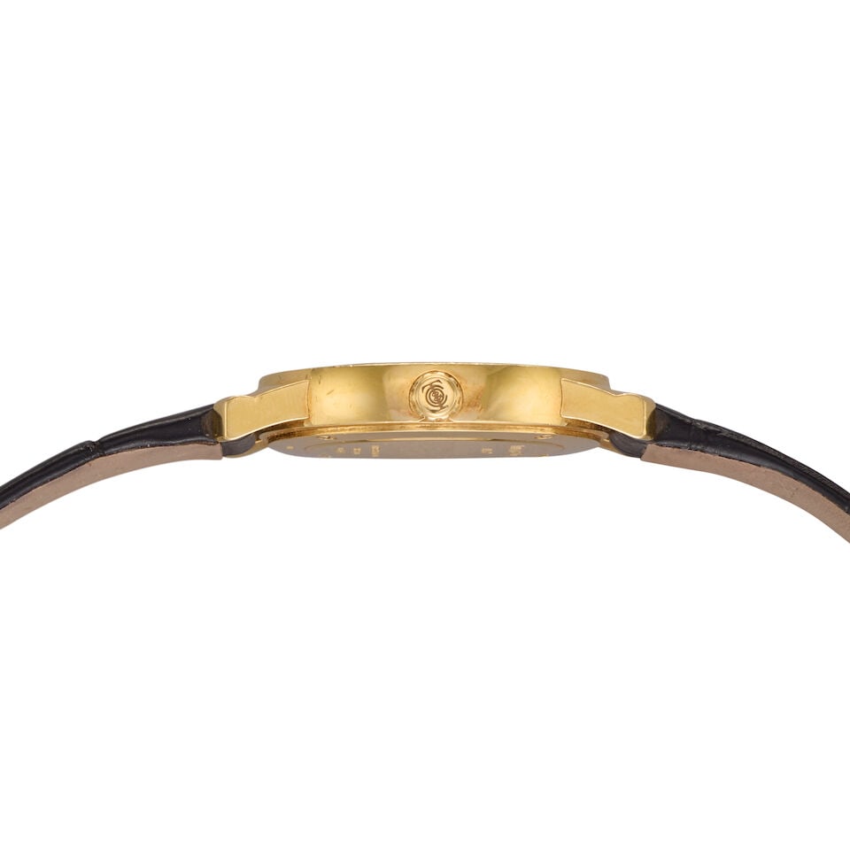Tiffany & Co. A lady's 18K gold quartz calendar wristwatch Atlas, Circa 2010 - 2