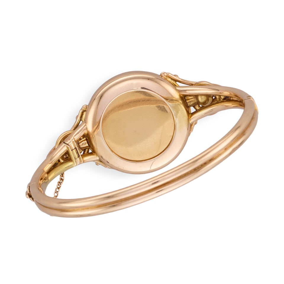 An 18K gold key wind half hunter pocket watch with later continental gold bangle Circa 1900 - 5