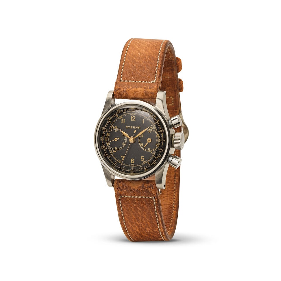 Eterna. A stainless steel manual wind chronograph wristwatch Eterna. Chronographe bracelet en ac...: Eterna. A stainless steel manual wind chronograph wristwatch Eterna. Chronographe bracelet en acier mouvement mécanique Date: Circa 1940 Movement: Jewelled manual wind Dial: Black, signed Case: P