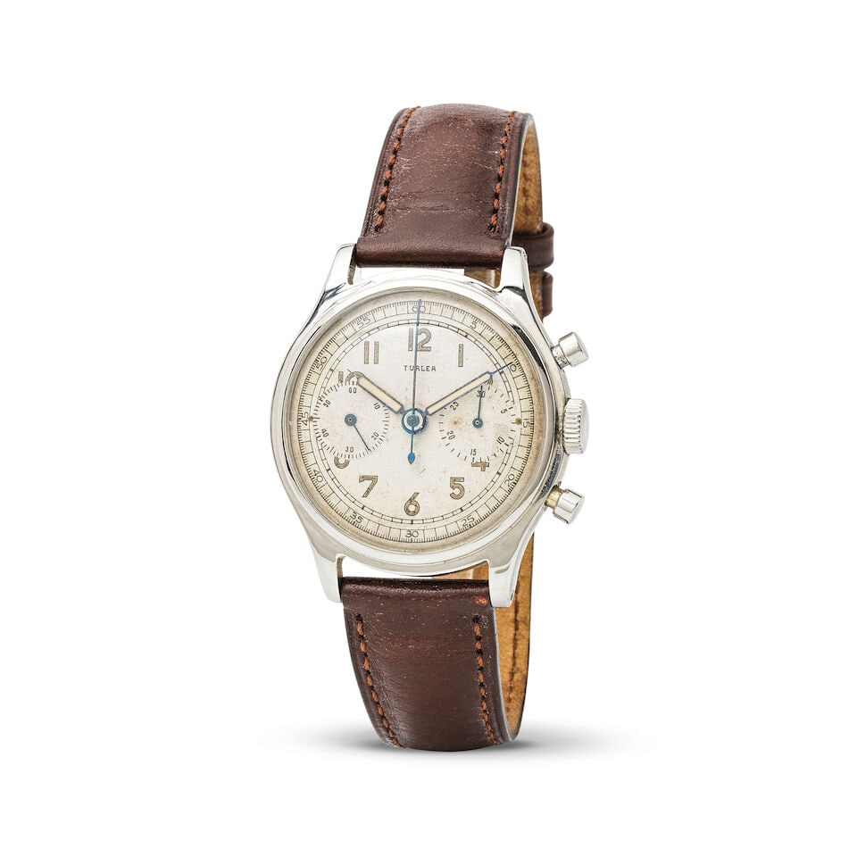 Türler. A staybrite steel manual wind chronograph wristwatch Türler. Chronographe brac...: Türler. A staybrite steel manual wind chronograph wristwatch Türler. Chronographe bracelet en métal mouvement mécanique Date: Circa 1950 Movement: Jewelled manual wind Dial: Silver