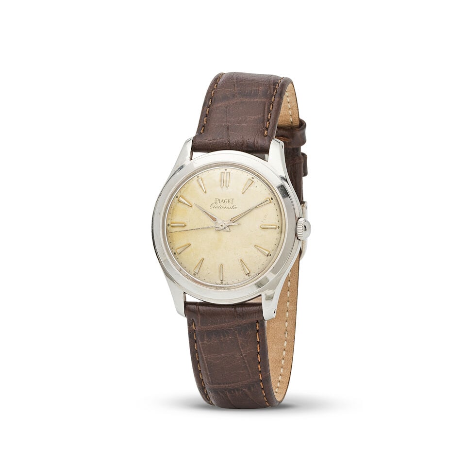 Piaget. A chrome and steel automatic wristwatch Piaget. Montre bracelet en plaqué chrome et...: Piaget. A chrome and steel automatic wristwatch Piaget. Montre bracelet en plaqué chrome et acier mouvement automatique Date: Circa 1950 Movement: 25-jewel Felsa Cal.1560 automatic Dial: Silvered