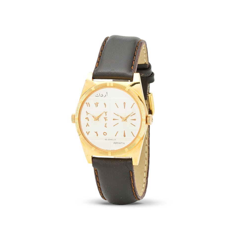 Ardath. A gold plated and steel manual wind dual dial wristwatch Ardath. Montre bracelet en plaq...: Ardath. A gold plated and steel manual wind dual dial wristwatch Ardath. Montre bracelet en plaqué or et acier à double cadran mouvement mécanique Date: Circa 1960 Movement: Dual 21-jew