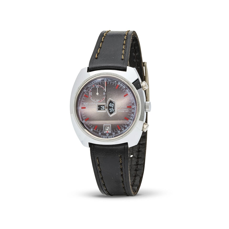 Sevan. A stainless steel automatic jump hour calendar chronograph wristwatch Sevan. Chronographe...: Sevan. A stainless steel automatic jump hour calendar chronograph wristwatch Sevan. Chronographe bracelet en plaqué chrome à guichet mouvement mécanique Date: Circa 1970 Movement: Jewel