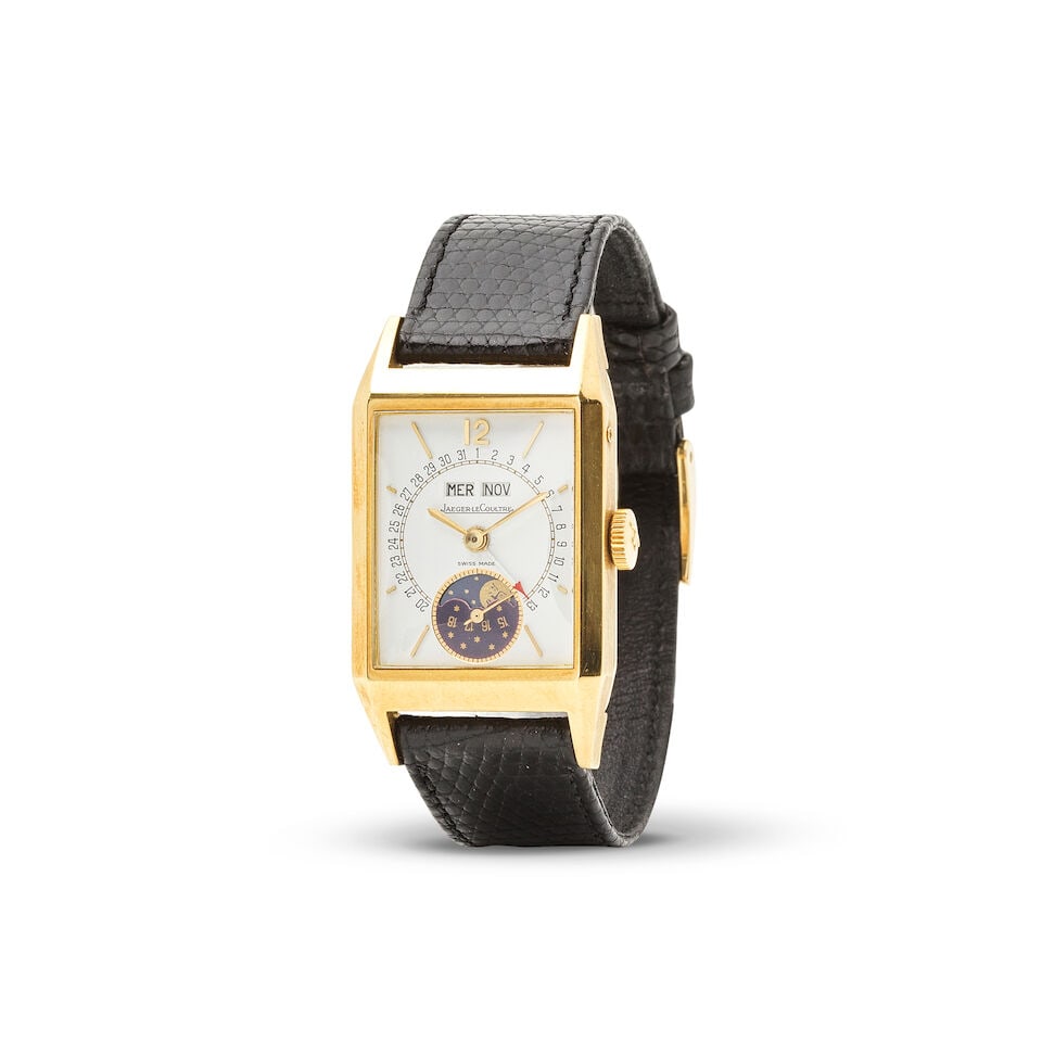 Jaeger-LeCoultre. A fine and rare 18K gold manual wind triple calendar rectangular wristwatch wi...: Jaeger-LeCoultre. A fine and rare 18K gold manual wind triple calendar rectangular wristwatch with moon phase Jaeger-LeCoultre. Belle et rare montre bracelet rectangulaire en or jaune 18K (750) avec t