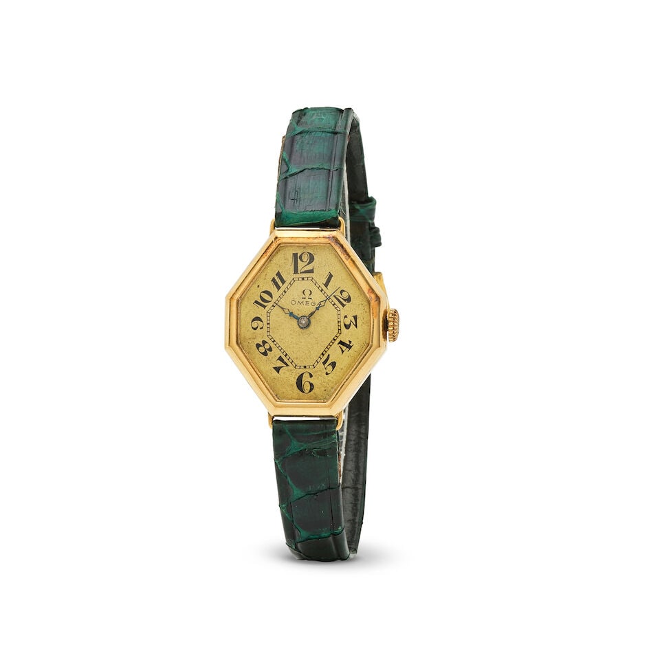 Omega. An 18K gold manual wind octogonal wristwatch Omega. Montre bracelet octogonale en or jaun...: Omega. An 18K gold manual wind octogonal wristwatch Omega. Montre bracelet octogonale en or jaune 18K mouvement mécanique Date: Circa 1920 Movement: 15-jewel manual wind Dial: Silvered,