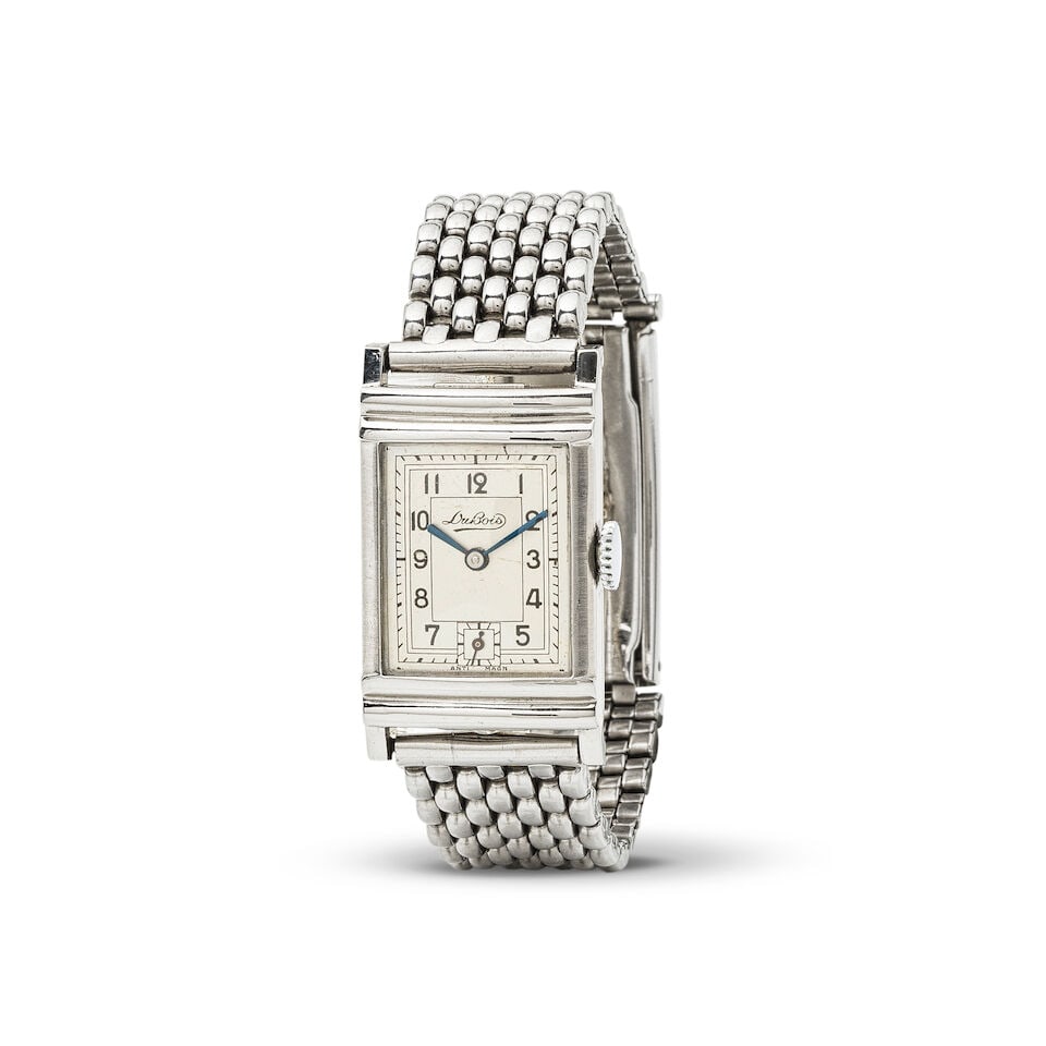 DuBois. A stainless steel manual wind rectangular bracelet watch Dubois. Montre bracelet rectang...: DuBois. A stainless steel manual wind rectangular bracelet watch Dubois. Montre bracelet rectangulaire en acier mouvement mécanique Date: Circa 1930 Movement: Jewelled manual wind Dial: