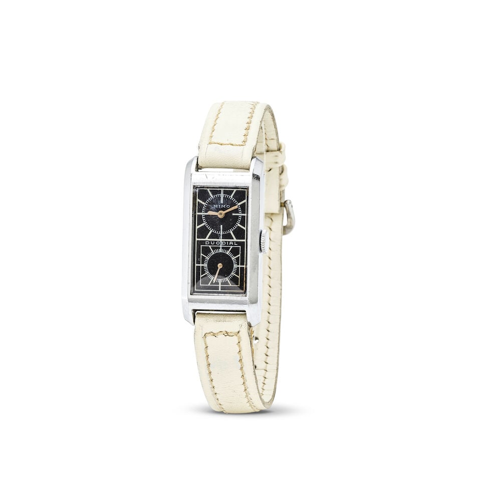 Mimo. A nickel chrome plated manual wind rectangular wristwatch Mimo. Montre bracelet rectangula...: Mimo. A nickel chrome plated manual wind rectangular wristwatch Mimo. Montre bracelet rectangulaire en nickel chromé mouvement mécanique Model: Duo Dial 'Doctors Watch' Date: Circa 1930 Move