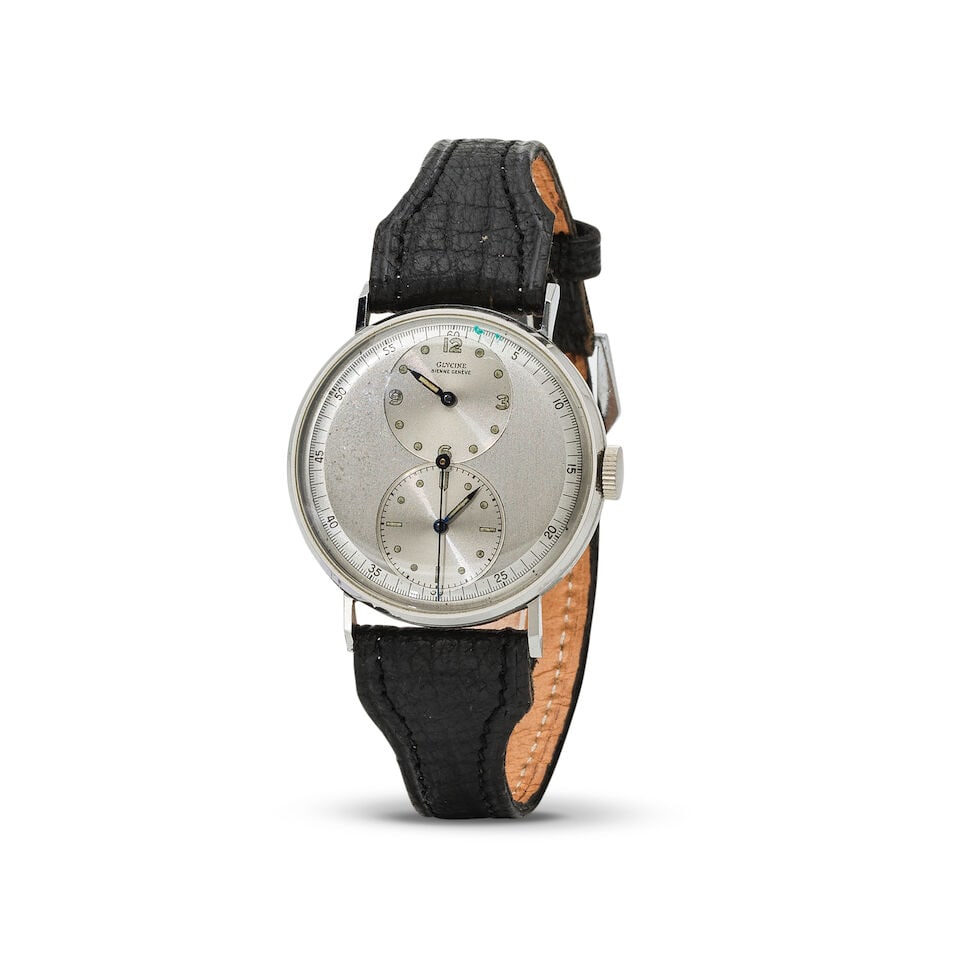 Glycine. A stainless steel manual wind wristwatch with regulator style dial Glycine. Montre brac...: Glycine. A stainless steel manual wind wristwatch with regulator style dial Glycine. Montre bracelet en acier avec cadran style régulateur mouvement mécanique Date: Circa 1950 Movement: 17-j