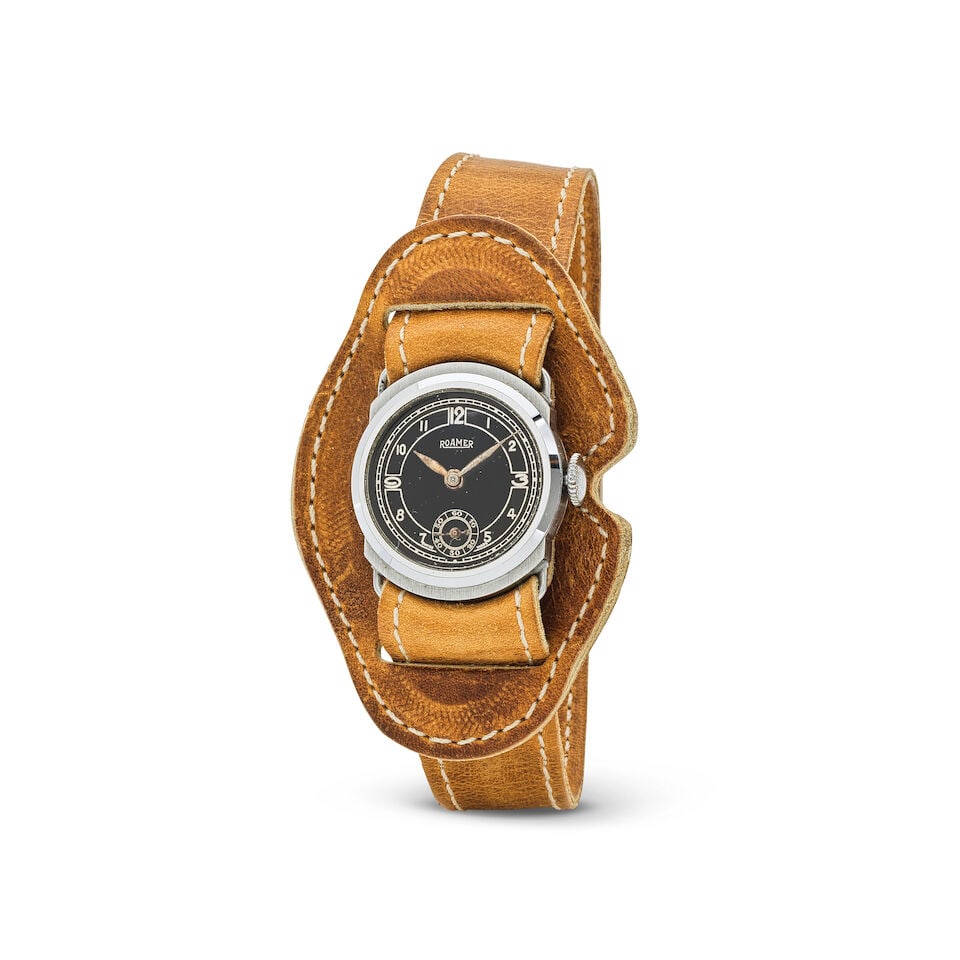 Roamer. A nickel and steel manual wind wristwatch Roamer. Montre bracelet en nickel et acier mou...: Roamer. A nickel and steel manual wind wristwatch Roamer. Montre bracelet en nickel et acier mouvement mécanique Date: Circa 1940 Movement: 15-jewel manual wind Dial: Black, signed Case: Brushed