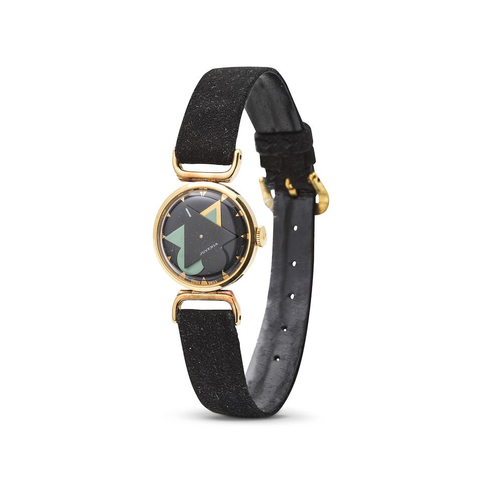 Juvenia. A lady's gold plated manual wind wristwatch Juvenia. Montre bracelet de dame en plaqu&#...: Juvenia. A lady's gold plated manual wind wristwatch Juvenia. Montre bracelet de dame en plaqué or mouvement mécanique Date: Circa 1950 Movement: Jewelled manual wind Dial: Mystery dial,