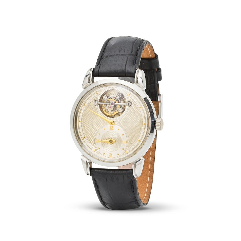 A stainless steel manual wind tourbillon wristwatch Montre bracelet en acier avec tourbillon mou...: A stainless steel manual wind tourbillon wristwatch Montre bracelet en acier avec tourbillon mouvement mécanique Date: Circa 1990 Movement: Jewelled manual wind Dial: Silvered, signed Case: Brush
