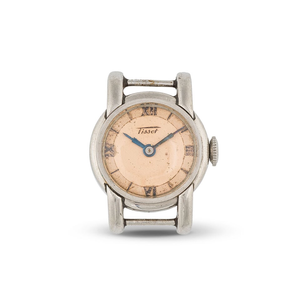 Tissot. A lady's stainless steel manual wind wristwatch Tissot. Montre bracelet de dame en m...: Tissot. A lady's stainless steel manual wind wristwatch Tissot. Montre bracelet de dame en métal mouvement mécanique Date: Circa 1950 Movement: Jewelled manual wind Dial: Salmon,