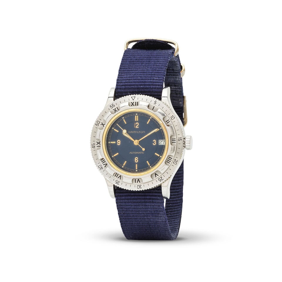 Hamilton. A steel and gold plated automatic calendar wristwatch with dual time zone Hamilton. Mo...: Hamilton. A steel and gold plated automatic calendar wristwatch with dual time zone Hamilton. Montre bracelet en plaqué or et acier avec date et 2nd fuseau horaire mouvement automatique Model: Ti