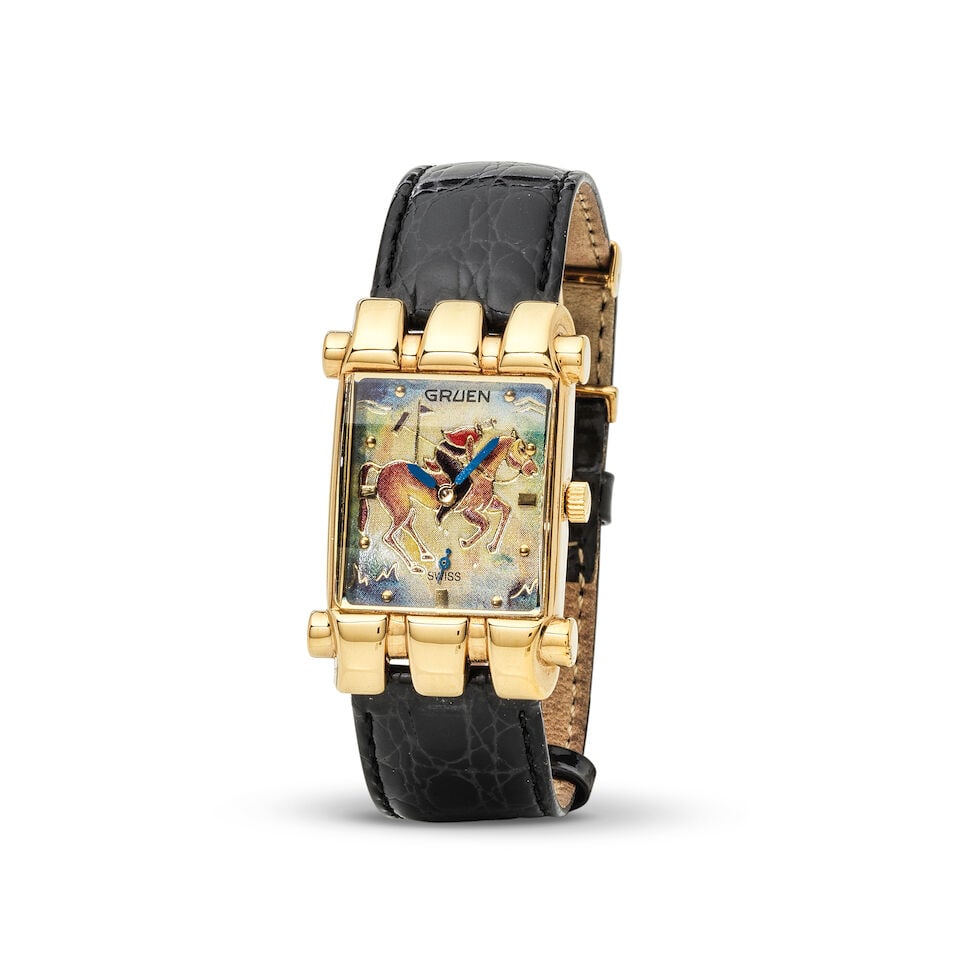 Gruen. A gold plated quartz rectangular wristwatch with fancy dial Gruen. Montre bracelet en pla...: Gruen. A gold plated quartz rectangular wristwatch with fancy dial Gruen. Montre bracelet en plaqué or de forme rectangulaire mouvement quartz Model: The Polo Player Reference: GR3232 Date: