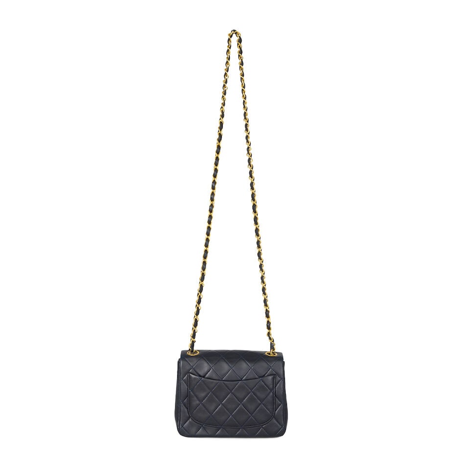 Chanel: a Navy Blue Quilted Lambskin Mini Square Flap Bag 1997-99 (includes serial sticker and d... - 2