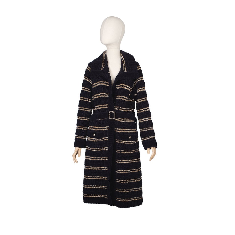 Chanel: a Navy Wool Knitted Long Cardigan 2020: Chanel: a Navy Wool Knitted Long Cardigan 2020 Creative Director: Virginie Viard Dark navy blue knitted wool blend cardigan with gold and white stripes, belt detail to waist, gold and black CC buttons