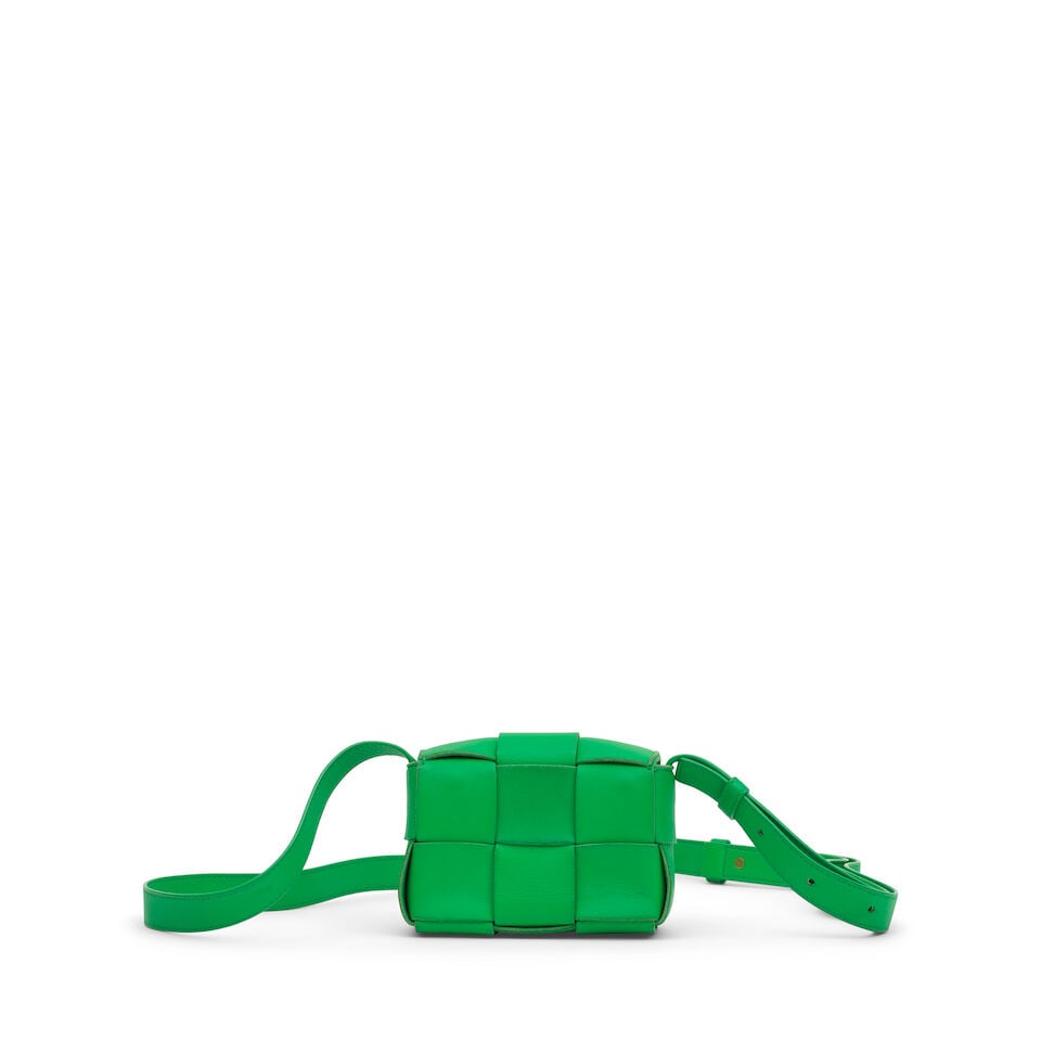 Bottega Veneta: a Parakeet Candy Cassette Bag (includes dust bag): Bottega Veneta: a Parakeet Candy Cassette Bag Creative Director: Daniel Lee Bright green Intrecciato leather with magnetic fastening Condition Grade A- 12cm wide, 8cm high, 5cm deep, 50cm shoulder dro