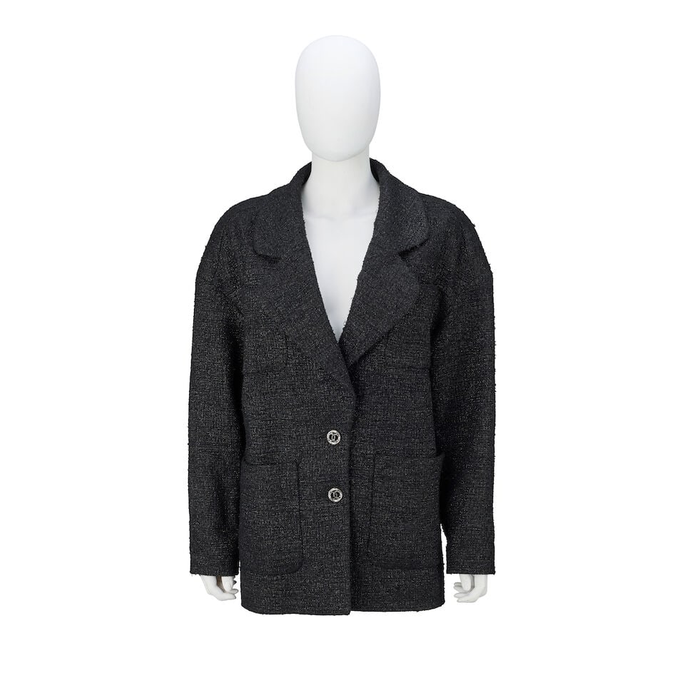 Chanel: an Oversized Black Tweed Blazer Spring 2020: Chanel: an Oversized Black Tweed Blazer Spring 2020 Creative Director: Virginie Viard Metallic black tweed with four patch pockets and two crystal studded CC buttons Condition Grade B+ Labelled size 3